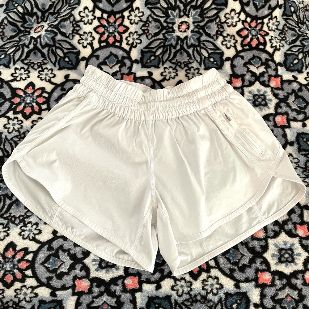 SOLD. White Trackers